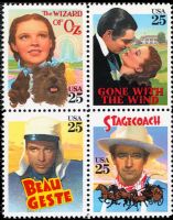 Scott 2445-2448; 2448a<br />25c Classic Films of 1939<br />Pane Block of 4 #2445-2448 (4 designs)<br /><span class=quot;smallerquot;>(reference or stock image)</span>