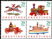 Scott 2711-2714; 2714a<br />29c Greetings - Toys<br />Pane Block of 4 #2711-2714 (4 designs)<br /><span class=quot;smallerquot;>(reference or stock image)</span>