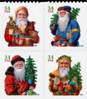 Scott 3541-3544; 3544a<br />34c Holiday Santas (VB)<br />Booklet Block of 4 #3541-3544 (4 designs)<br /><span class=quot;smallerquot;>(reference or stock image)</span>