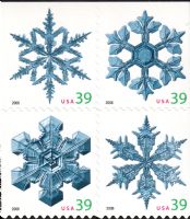 Scott 4109-4112<br />39c Snowflakes (VB)<br />(From <a href=quot;https://www.bardostamps.com/back-of-book-united-states-stamps/1990/scott-catalog-BK303quot;>BK303 </a><br />Booklet Block of 4 #4112a (4 designs)<br /><span class=quot;smallerquot;>(reference or stock image)</span>