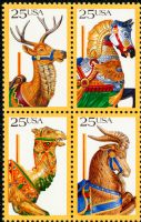 Scott 2390-2393<br />25c Carousel Animals<br />Pane Block of 4 #2393a (4 designs)<br /><span class=quot;smallerquot;>(reference or stock image)</span>