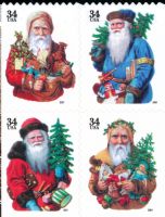 Scott 3540c<br />34c Holiday Santas (DSB)<br />Small 2001 Date; Double-Sided Booklet Block of 4 #3537a-3540a (4 designs)<br /><span class=quot;smallerquot;>(reference or stock image)</span>